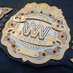 Custom wrestling championship belt with gold plates and personalized engraving