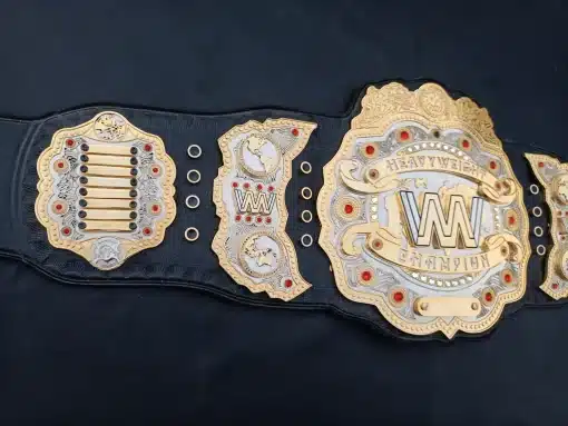 View of side and center plates on custom wrestling belt with nameplate rows and map engravings