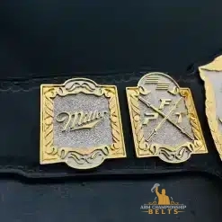 Close-up of personalized side plates on Hyrox Tag Team Fitness Belt with gym logos