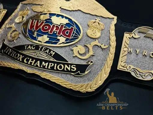 Shiny gold HD engraved plates on championship belt made for fitness and strength events
