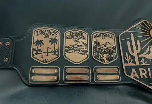 Removable nameplates on championship belt for yearly golf winners