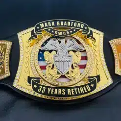 Custom Navy Chief retirement belt showing personalized name Mark Bradford, CW05 rank, and 33 years retired banner on gold HD engraved plates.