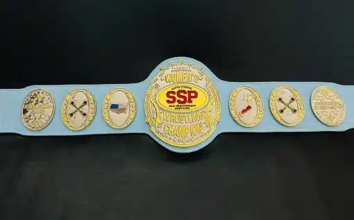 Women’s wrestling championship belt with custom engraved plates, gold finish, and premium leather strap