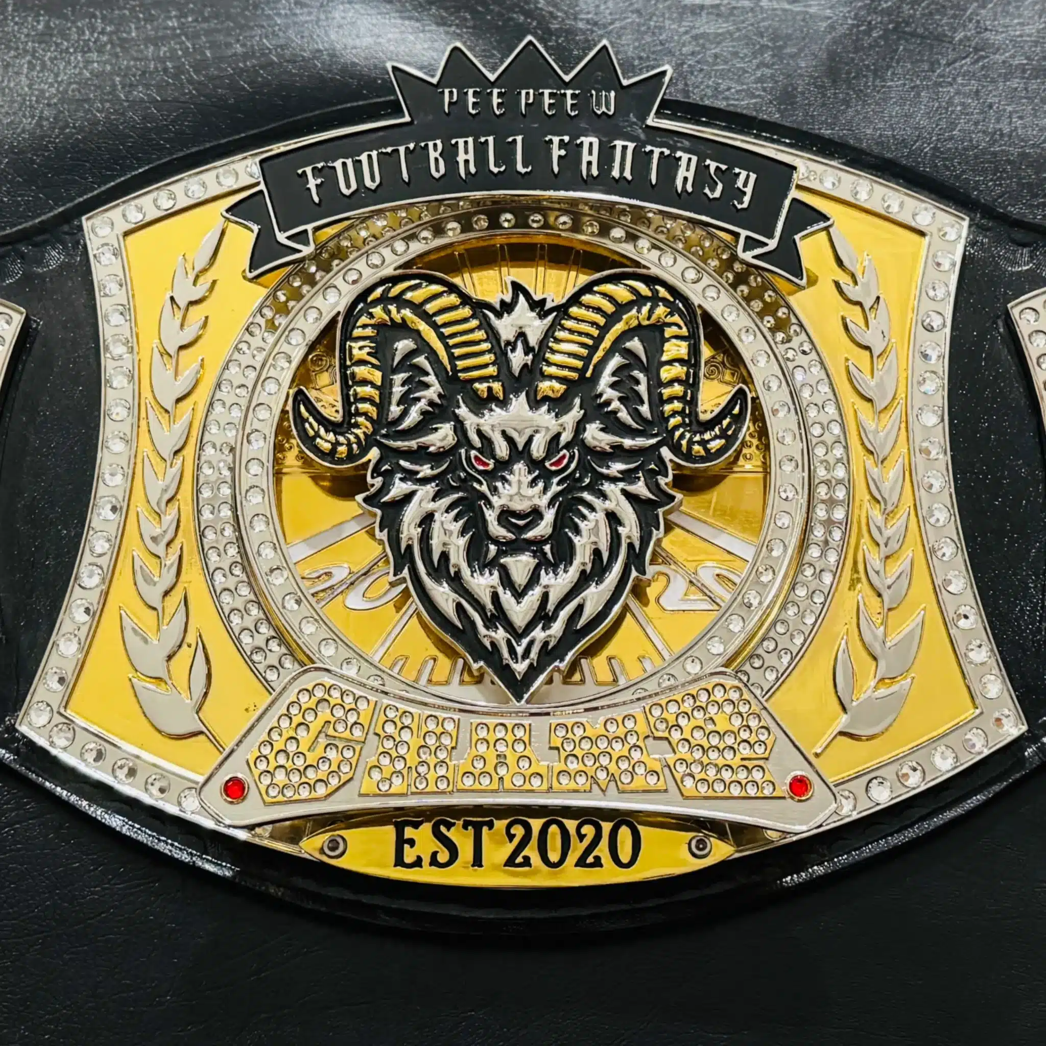 fantasy football trophy belt with spinner center plate, 5mm deep HD engraved zinc plates, and gold chrome finish.