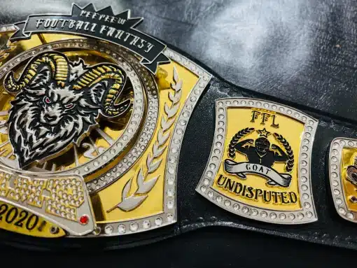 Personalized fantasy football league logos engraved on side plates of custom championship trophy belt.