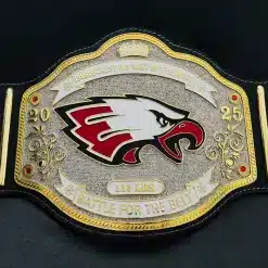 Custom Battle for the Belt championship belt made for Eaglecrest High School with eagle logo, year panels, and wrestling side plates.