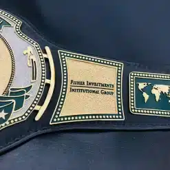 Institutional recognition side plates on a custom championship belt with premium gold finish