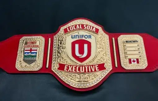 Executive title banner on custom leadership championship belt with premium gold finish